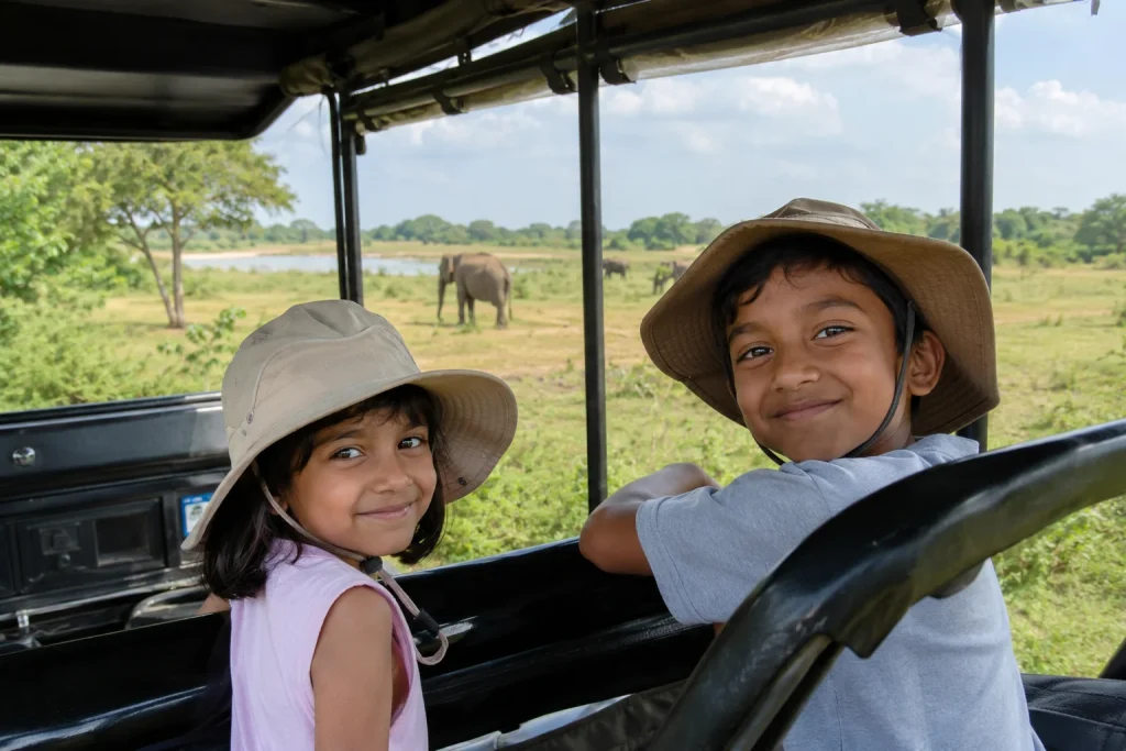 Children wearing hats during Udawalawe safari